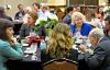 Conference attendees enjoy conversation as they await lunch preceding the awards ceremony.
